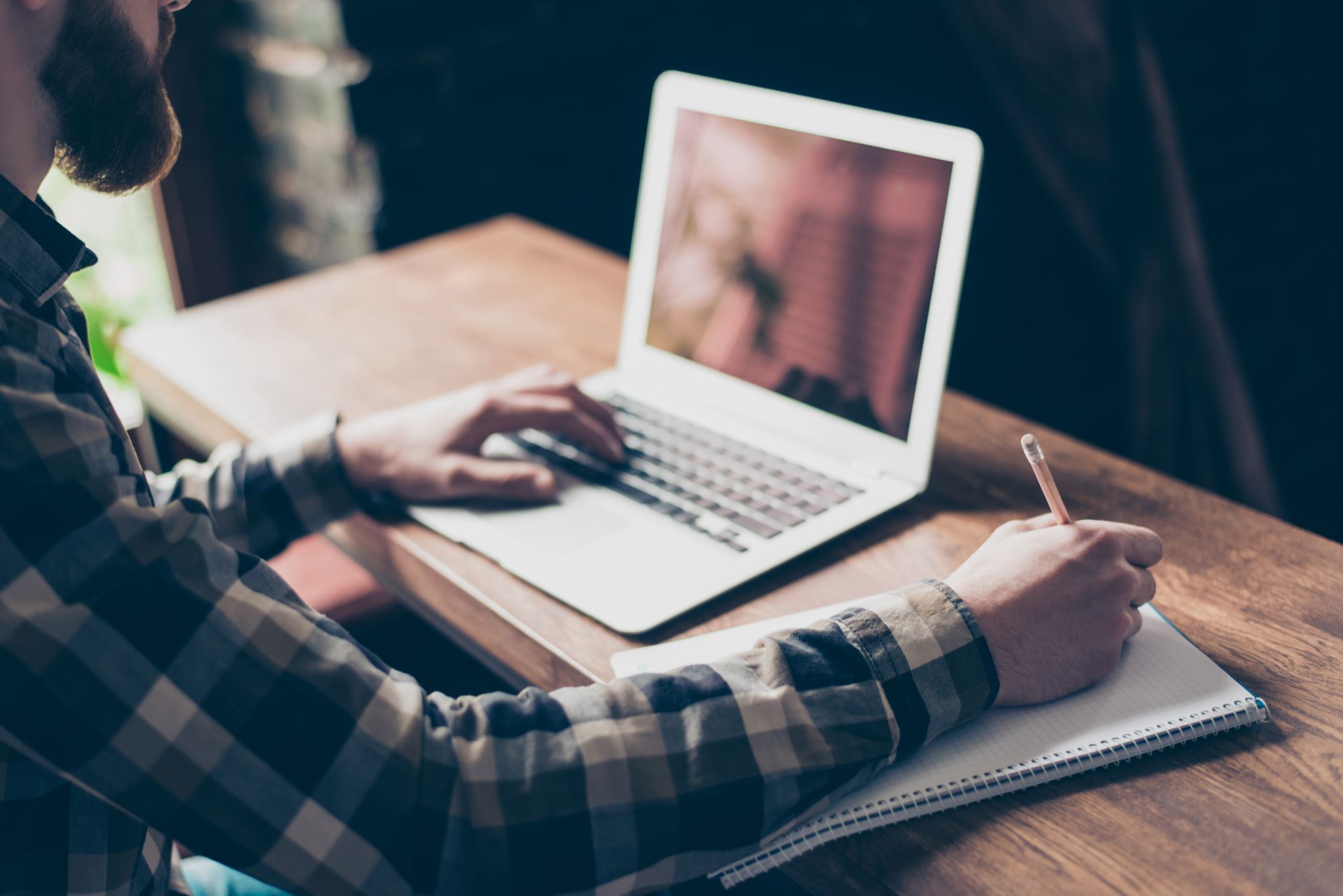 Person looking at grant opportunities on laptop